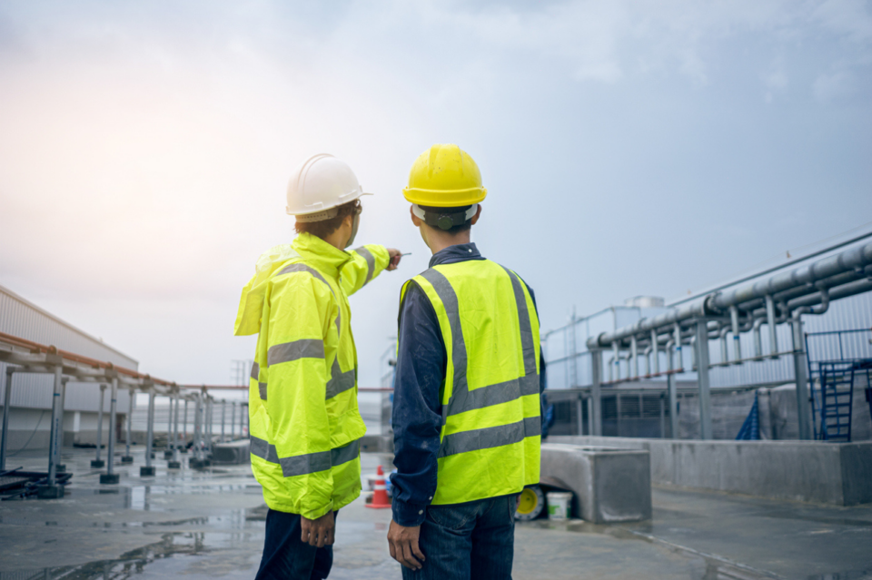 Engineer consult discussion with team work for install pipe. stock photo